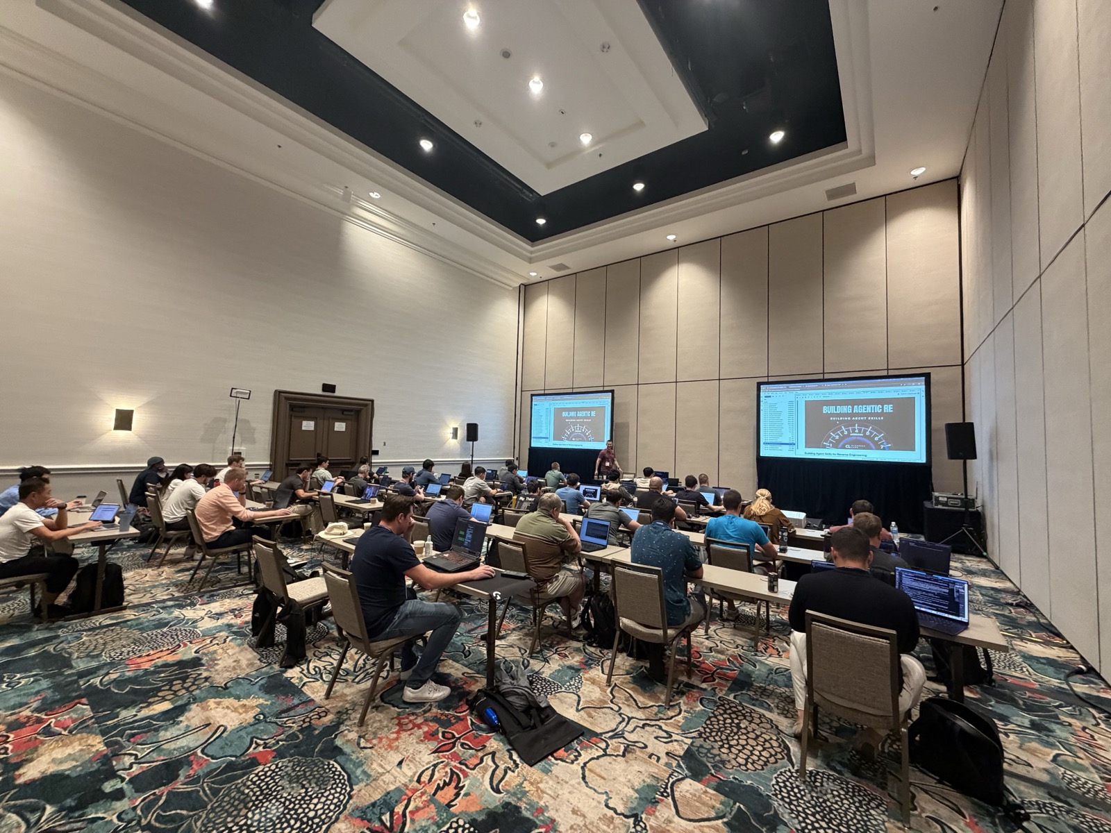A full room during the Building Agentic RE Skills workshop at DEF CON 34 in Las Vegas